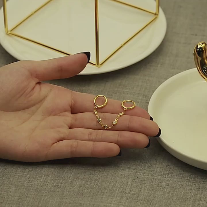 Double boucle d'oreille chaine video